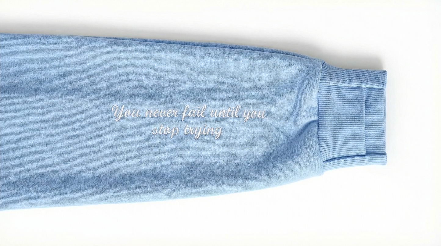 BABY BLUE HOODIE - NEVER STOP TRYING QUOTE